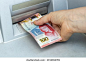 Mexican money withdrawn from the ATM, Financial and economic concept related to inflation and rising cost of living 库存照片