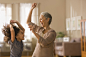 Grandmother and granddaughter dancing together by Gable Denims on 500px
