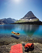 Lounging in crystal clear waters at Hidden Lake, Montana. by Travis Burke