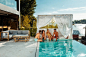 Happy friends having fun while sitting at the edge of the pool stock photo