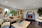 Modern living room with dark hardwood floor.