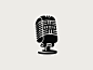 Microphone + African knowledge symbol