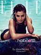 《Elle》杂志西班牙版2013年5月号泳装封面大片欣赏：超模Helena Christensen演绎时尚健康的沙滩女郎！