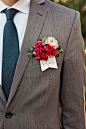 boutonniere on the pocket with a cute dovetail tag.