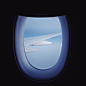 window panel overlooking airplane wings