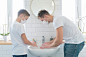 father-son-washing-their-hands-together_23-2148511143