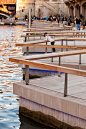 people standing at jetty