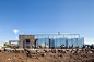 A Café With Pivoting Doors On A Volcanic Island