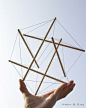 6 strut tensegrity structure held in a hand. - #hand #held #structure #strut #tensegrity