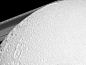 Enceladus, Saturn's Amazing Snowball Moon : On October 28, NASA’s Cassini orbiter will be making its deepest-ever dive through the ocean spray from Enceladus—passing within a mere 30 miles of the icy surface. 