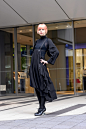 Image may contain Coat Clothing Apparel Sleeve Long Sleeve Footwear Shoe Evening Dress Fashion Gown and Robe