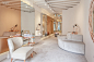 Christian Lahoude Studio Crafts an Ultra-Feminine Boutique for Shoe Brand Josefinas : A Munna loveseat and side tables by Ginger & Jagger at Josefinas, a women's shoe store in NoLIta by Christian Lahoude Studio. Photography by Scott Norsworthy. 