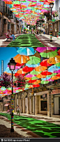 Umbrella street... this would be cute to do for an outdoor wedding or birthday party