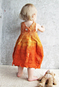 Nuno-felted baby pumpkin dress