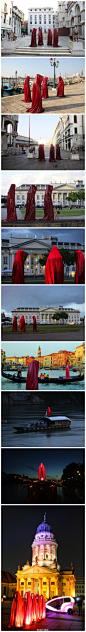 这是奥地利艺术家Manfred Kielnhofer的艺术项目“时间的守卫者”。三个巨型的人形支架，光从内往外打，一件红色拖地披风，就成了一组艺术品。这组艺术品正在巡展中，它们出现在不同城市的不同场景。而它们随着不同场景有不同的效果。晚上鬼魅异常，阴天雨中又显落寞感,为城市空间带来几分诡计。