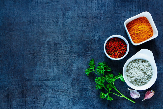 Spices in bowls by Y...