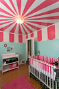 Carnival-themed girl's nursery! The "big top" ceiling is amazing!