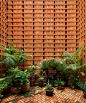 this studio of rhythmic brickwork was completed for a renowned mexican photographer
