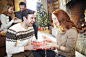 Couple exchanging gifts on Christmas by Caia Images on 500px