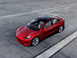 红色特斯拉model 3汽车图片