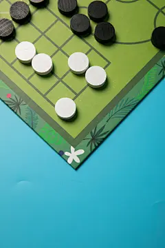 黑白棋儿童棋类益智玩具摄影图