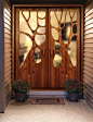 I think this is a most beautiful front door. From the site "The two doors above are by artist and furniture designer Victor Klassen who we showcased a few weeks ago. The way he shapes wood, bending and molding it like clay, is something only a master