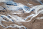 INTERTWINED : aerial photographs of Icelandic glacial rivers mixing with volcanic soil and sediments 