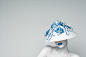White Garden : White Garden is a project which mixes the iconic hats, flower compositions and minimalistic looks. The model's skin was painted in white and with the light background it makes more accent on the colors. All the paper hats are handmade by im