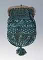 Hand knitted coin purse, 1830-1850. American. Silk yarn, glass beads and metal frame. 3 1/4 in. x 5 1/4 in. Met Museum.