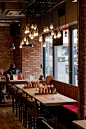 Restaurant Interior . Brick Walls . Light Bulbs . Rustic