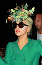 Lady Gaga, donning an eff-the-recession Philip Treacy hat, makes the promotional rounds in London.