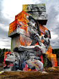 Graffiti artists Pichi & Avo painted their trademark style of Greek Gods over a background of graffiti on stacked shipping containers for a Belgian street art festival. (pic 1/5): 
