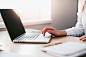 Business Woman Working on Laptop in Her Office Free Stock Photo