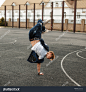 stock-photo-young-handsome-man-in-stylish-denim-dress-dancing-hip-hop-644065741