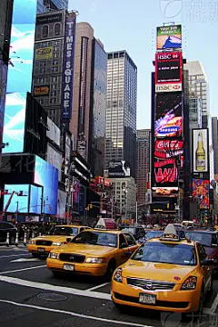 Three Yellow taxi Times Square