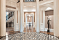 Traditional Classical Neutral Entry Gallery : Builder Joseph DeCesaris introduced eight massive, 24-foot-high Tuscan columns to the entry gallery after the house was framed.