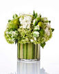 Flower delivery in Chicago by Chicago florist - green hydrangea, white parrot tulips, white spray roses, mini limes, striped leaf vase - Lim...: 