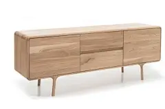 At the core of the Fawn sideboard is the combination of beautiful natural materials and modern craftsmanship as demonstrated by the slender oak frame inspired by the delicate profile of a baby deer. The gentle lines of this wide storage piece create a lig
