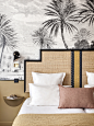 hotel doisy woven headboard and black and white tropical mural wallpaper | statement headboard roundup on coco kelley