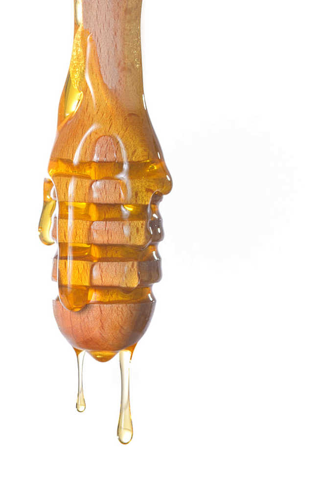 Honey dripping by Io...
