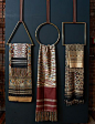 Bold display to showcase scarves against a dark moody background.