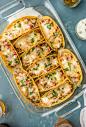SUPER EASY Oven Baked Spicy Chicken Tacos make a weekly appearance on our table. All the flavor and none of the stress. ALL THAT MELTED CHEESE! Perfect recipe for a crowd on Family Mexican Night!