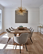 Dining room - contemporary medium tone wood floor and brown floor dining room idea in New York with white walls