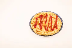 白底葱油饼早餐饼类餐饮美食摄影图