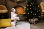 Dog Jack Russell Terrier and Christmas tree