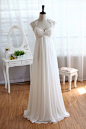 Dress: Lace Chiffon Wedding Dress Keyhole Back Empire Waist with Cap Sleeves What I love: Very dreamy feel, and one of the only empire dresses I've seen and really liked! I think it's the sleeves and the neckline.