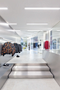 Acquasalata Clothing Store in Cattolica, Italy by Storage Associati | Yellowtrace : Storage Associati's Acquasalata store in Cattolica combines an edited palette of materials with clever use of coloured grids and strip lighting.