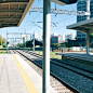 gray metal train rail during daytime