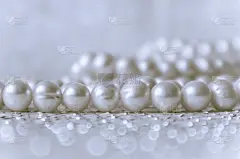 自然白色珍珠珠闪闪发光的背景