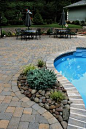 cst paver patio swimming pool deck - like the stones inside landscaping...and I like the placement near the pool...